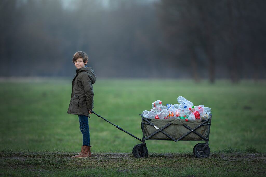 Dani collecting bottles for JDI