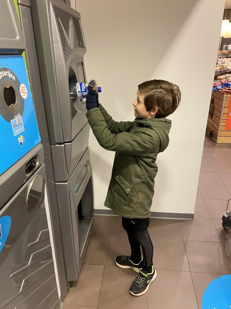 Dani handing in bottles for JDI